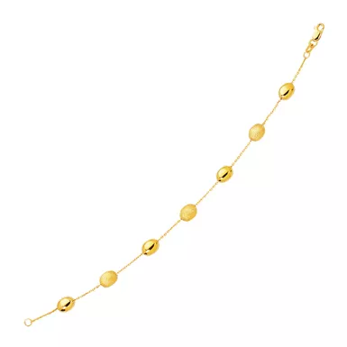 14k Yellow Gold Bracelet with Textured and Polished Pebble Stations (7.25 Inch)