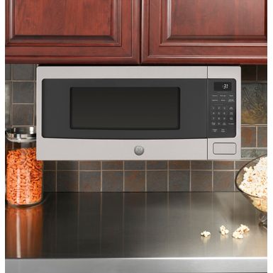 Alt View Zoom 14. GE - Profile Series 1.1 Cu. Ft. Mid-Size Microwave with Sensor Cooking - Stainless steel