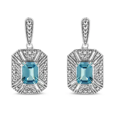 image of .925 Sterling Silver 7x5MM Emerald Shape Blue Topaz and Diamond Accent Art Deco Halo Style Drop and Dangle Earrings (I-J Color, I1-I2 Clarity) with sku:018948eash-luxcom