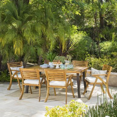 image of Della Outdoor 7-Piece Rectangle Acacia Wood Dining Set with Cushions by Christopher Knight Home - Teak Finish With Rustic Metal + Teak Finish with sku:ulivnzibzyoj3pks4gs1tqstd8mu7mbs-chr-ovr