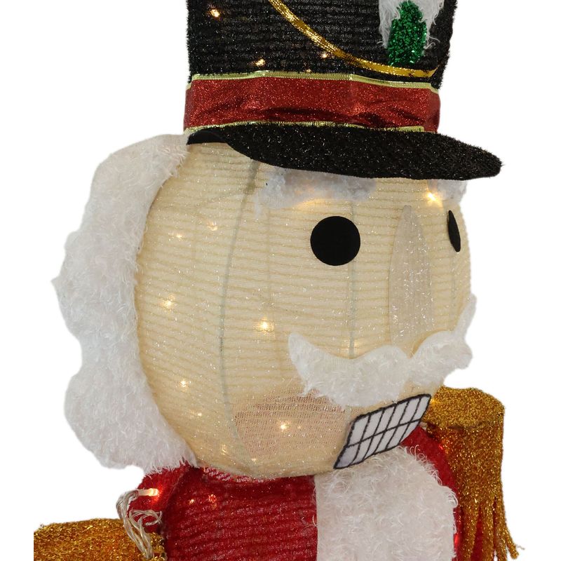 Fraser Hill Farm 6-Ft. Prelit Tinsel Nutcracker Indoor or Outdoor Decoration