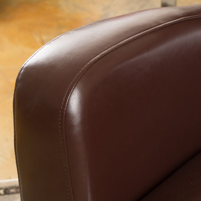 Angelo Bonded Leather Wingback Swivel Club Chair by Christopher Knight Home - Dark Brown