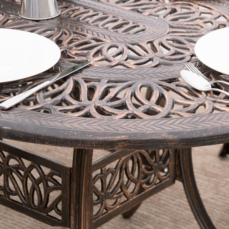Haitian Outdoor Cast Aluminum Oval Dining Table (ONLY) by Christopher Knight Home - Copper
