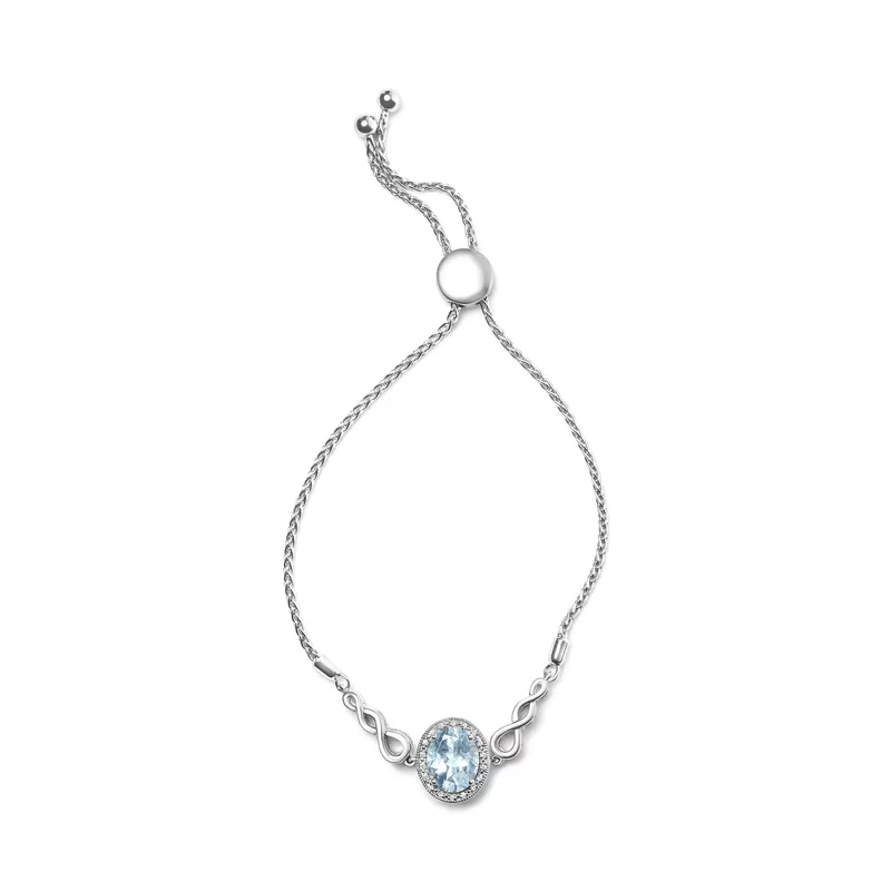 .925 Sterling Silver 10x8mm Oval Blue Topaz and Diamond Accent Lariat 4”-10” Adjustable Bolo Bracelet (H-I Color, SI1-SI2 Clarity)