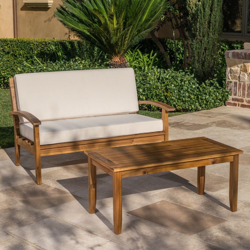 Peyton Outdoor 2-piece Acacia Wood Loveseat and Coffee Table Set with Cushions by Christopher Knight Home - Teak Finish + Red