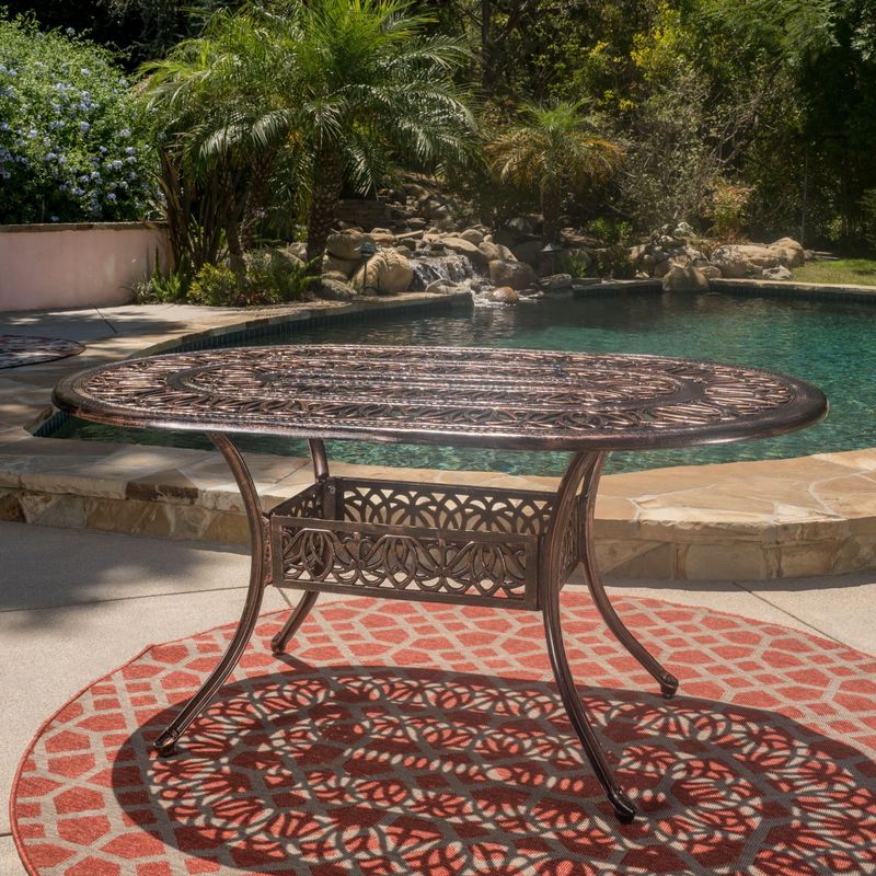 Haitian Outdoor Cast Aluminum Oval Dining Table (ONLY) by Christopher Knight Home - Copper