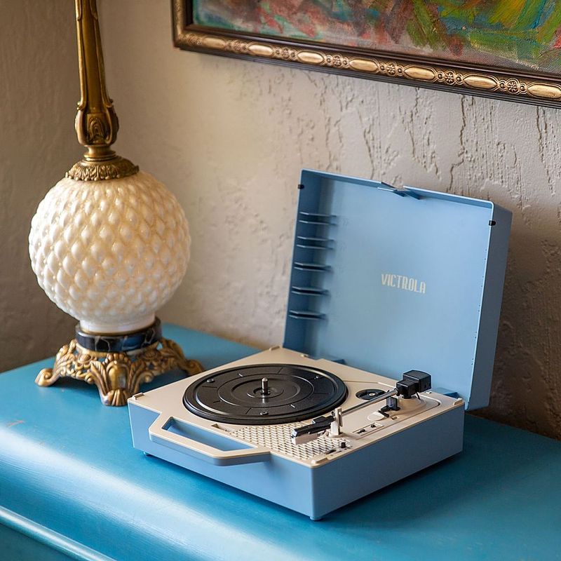 Alt View Zoom 11. Victrola - Re-Spin Sustainable Bluetooth Suitcase Record Player - Light Blue