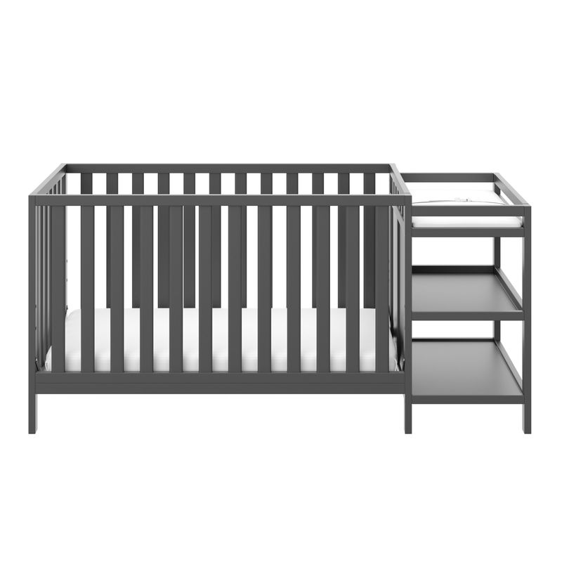 Storkcraft Pacific 4-in-1 Convertible Crib and Changer - 2 Open Shelves, Water-Resistant Vinyl Changing Pad with Safety Strap - Black