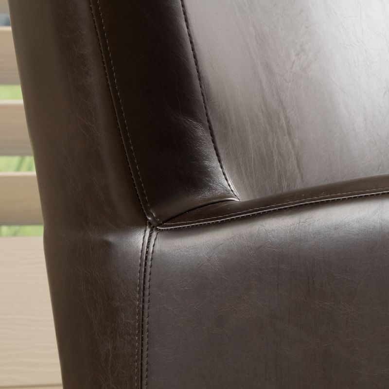Angelo Bonded Leather Wingback Swivel Club Chair by Christopher Knight Home - Dark Brown